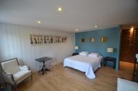 Hotel L'Océanにあるベッド