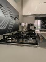 Kuchyň nebo kuchyňský kout v ubytování Casa Eva con piscina privata