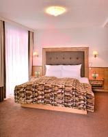 Posteľ alebo postele v izbe v ubytovaní Hotel Garni Urezza