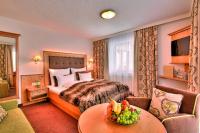 Posteľ alebo postele v izbe v ubytovaní Hotel Garni Urezza