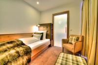 Posteľ alebo postele v izbe v ubytovaní Hotel Garni Urezza