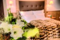 Posteľ alebo postele v izbe v ubytovaní Hotel Garni Urezza
