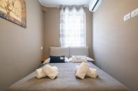 A bed or beds in a room at Pepi Modern by Mmega