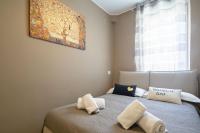 A bed or beds in a room at Pepi Modern by Mmega