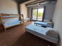 Posteľ alebo postele v izbe v ubytovaní Sea Hostel