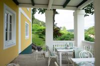 A garden outside Villa Bella Vista - Apartment Green