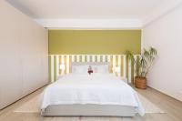 A bed or beds in a room at Villa Bella Vista - Apartment Green
