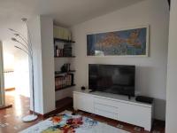Televízia a/alebo spoločenská miestnosť v ubytovaní casa smeraldo