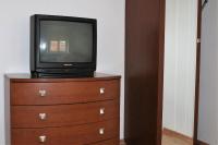 Televízia a/alebo spoločenská miestnosť v ubytovaní Apartament Pod Krzywą Wieżą - zameldowanie 24 h