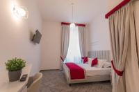 Posteľ alebo postele v izbe v ubytovaní Frattina FF italian suites