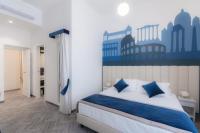 Posteľ alebo postele v izbe v ubytovaní Frattina FF italian suites