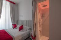 Posteľ alebo postele v izbe v ubytovaní Frattina FF italian suites