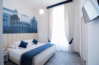 Posteľ alebo postele v izbe v ubytovaní Frattina FF italian suites