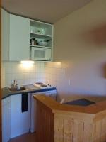 A cozinha ou cozinha compacta de travelski home classic - Vue Pistes