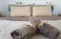 Posteľ alebo postele v izbe v ubytovaní Erika Boutique Apartments