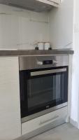 Kuchyňa alebo kuchynka v ubytovaní Erika Boutique Apartments
