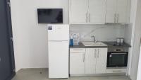 Kuchyňa alebo kuchynka v ubytovaní Erika Boutique Apartments