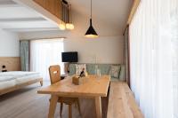Posteľ alebo postele v izbe v ubytovaní Weingut Schmid Oberrautner Apartment Suites