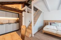 Posteľ alebo postele v izbe v ubytovaní Weingut Schmid Oberrautner Apartment Suites