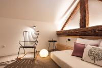 Posteľ alebo postele v izbe v ubytovaní Weingut Schmid Oberrautner Apartment Suites