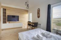 Postel nebo postele na pokoji v ubytování Mountain Apartments Klínovec Hexagon
