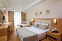 Postel nebo postele na pokoji v ubytování Titan Select Hotel Ultra All Inclusive