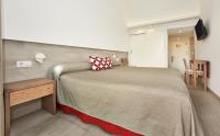 Postel nebo postele na pokoji v ubytování Hoposa Hotel & Apartaments VillaConcha