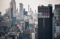 a view of a city skyline with tall buildings at citizenM New York Times Square in New York