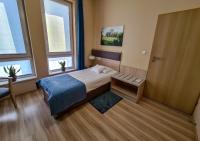 Posteľ alebo postele v izbe v ubytovaní Antonińska Hotel & Apartamenty