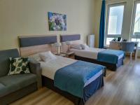 Posteľ alebo postele v izbe v ubytovaní Antonińska Hotel & Apartamenty