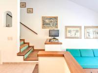 TV a/nebo společenská místnost v ubytování Beachside Holiday home in Punta Ala