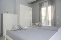 Posteľ alebo postele v izbe v ubytovaní Manos Housing Units
