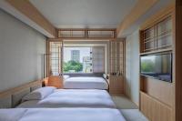 ONSEN RYOKAN 由縁 札幌にあるベッド