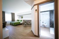 Łóżko lub łóżka w pokoju w obiekcie Bonotto Hotel Palladio