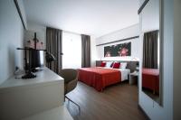 Łóżko lub łóżka w pokoju w obiekcie Bonotto Hotel Palladio
