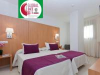 Postel nebo postele na pokoji v ubytování Hotel Verol