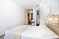Postel nebo postele na pokoji v ubytování Moscha Hotel