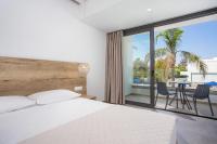 Postel nebo postele na pokoji v ubytování Moscha Hotel