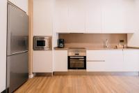 Kuchyňa alebo kuchynka v ubytovaní Apartamentos Rúa Vella