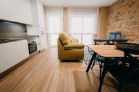 Kuchyňa alebo kuchynka v ubytovaní Apartamentos Rúa Vella