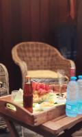 a table with a tray of food and drinks on it at B&amp;B Aquavert &amp; Wellness in Tournai