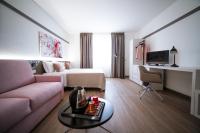 Telewizja i/lub zestaw kina domowego w obiekcie Bonotto Hotel Palladio