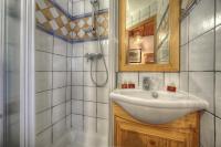 a bathroom with a sink and a shower at Chalet-Hôtel de l&#39;Etape in Les Contamines-Montjoie