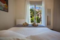 Posteľ alebo postele v izbe v ubytovaní Acropolis Slow Living apt under the Parthenon