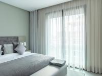 Makass Appart Hotelにあるベッド