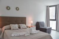 Posteľ alebo postele v izbe v ubytovaní DanySer Suites Vacacionales