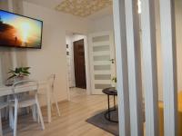 A television and/or entertainment centre at Pisztácia 2020 Apartman