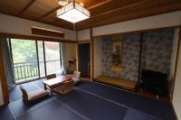Onsen & Garden -Asante Inn-にあるテレビまたはエンターテインメントセンター