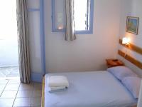 Posteľ alebo postele v izbe v ubytovaní Apollon Rooms