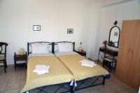 Posteľ alebo postele v izbe v ubytovaní Apollon Rooms